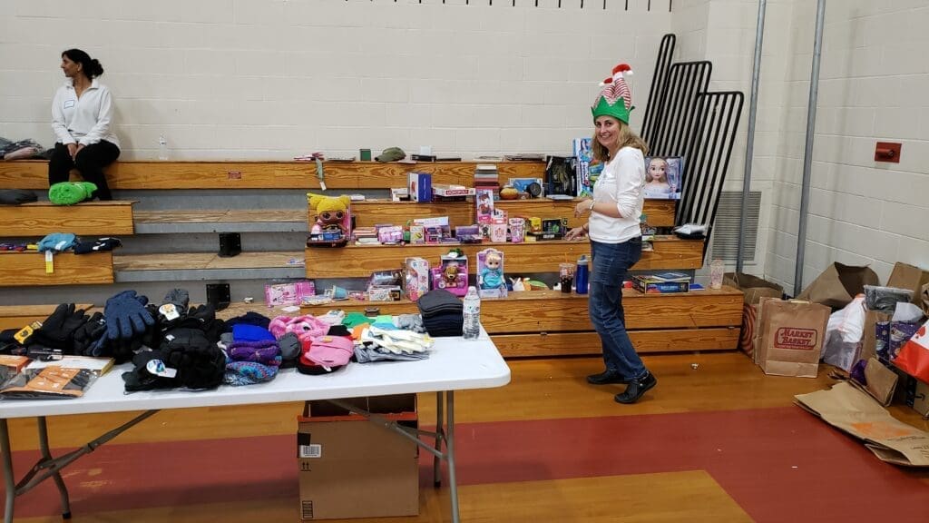 Gym bleachers with toys ready to be added to bags. 